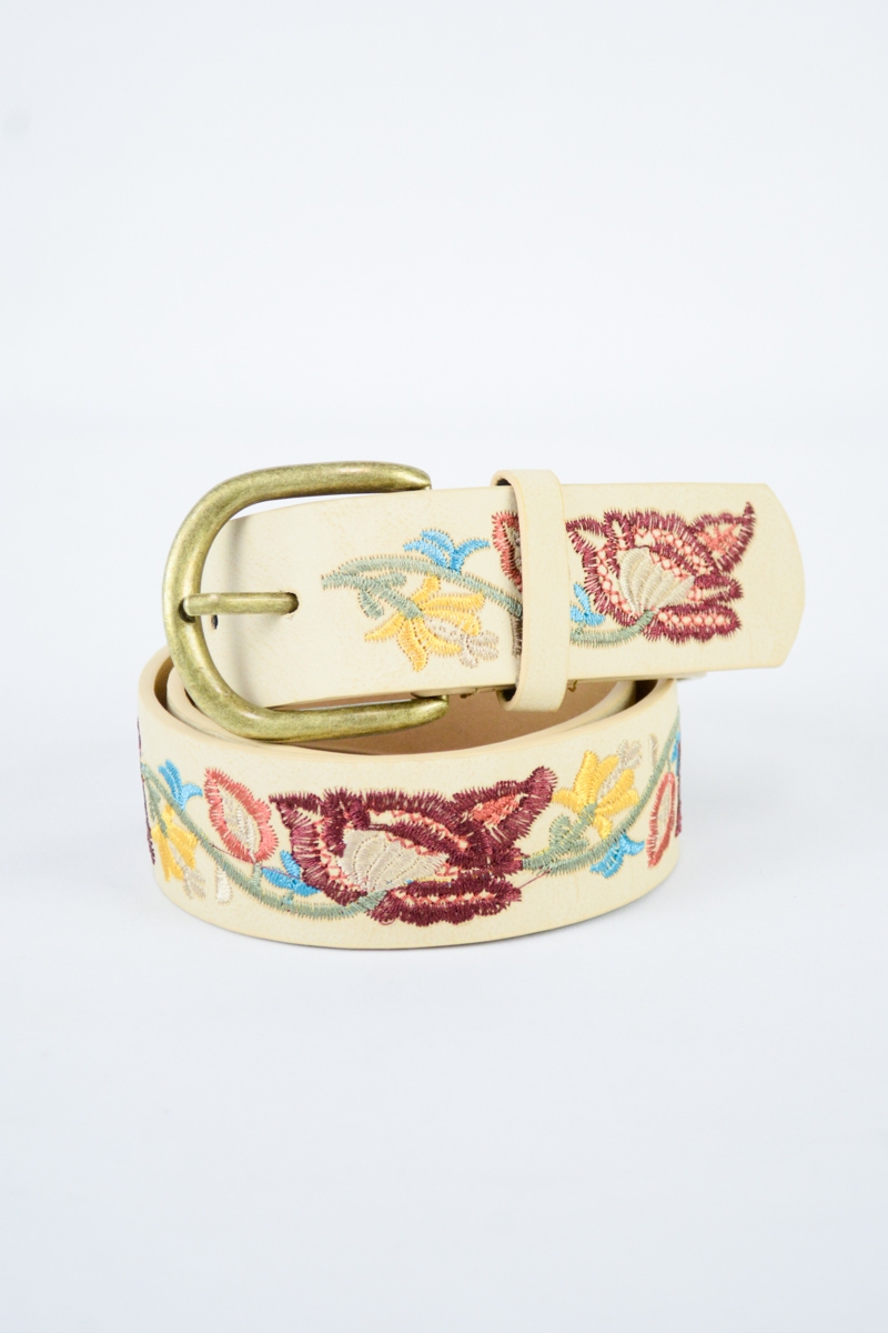 Closeup of flower embroidered statement belt