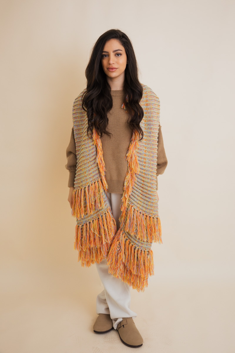 Fluffy knit scarf with fringe     winter chic essential