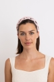 Blush woven lightweight Alice headband with a textured summer design.