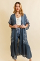 Young model wearing boho tribal embroidered longline kimono in front pose blue
