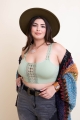 Plus-size eye lace applique bralette with padded design, perfect for curvy lingerie and intimate wear.