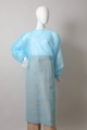 Lightweight disposable non-woven protective gown for hygiene and safety.