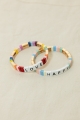 Stock view of the Love stackable party bracelet with charm details