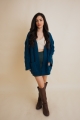 Teal cozy cable knit open front cardigan with relaxed fit design
