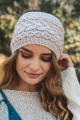 White wide cable knit headband offering soft and cozy warmth for winter looks.