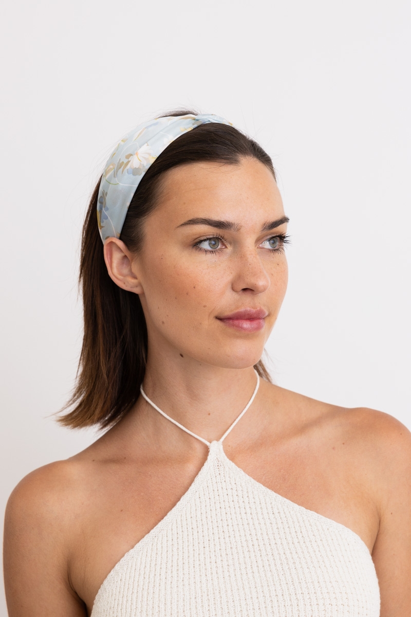 Smooth satin floral headband featuring Secret Garden-inspired design.