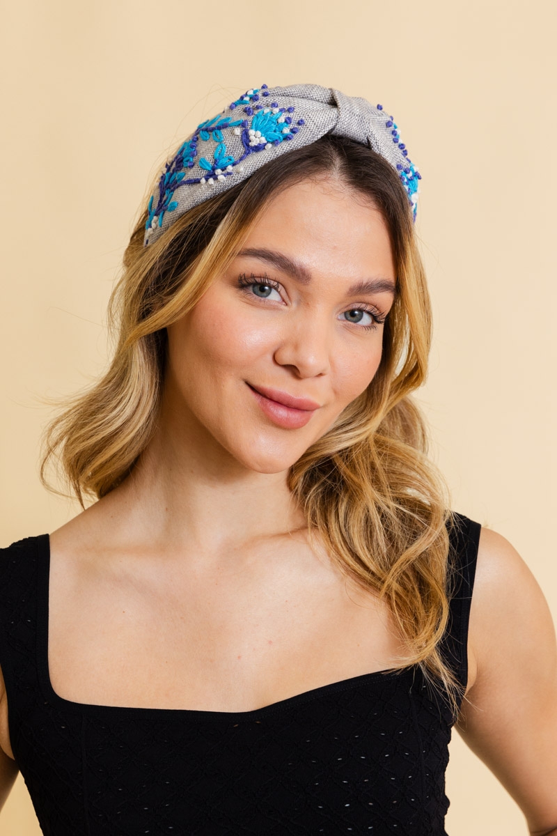 Gray aqua floral embroidered headband featuring elegant blossom design.