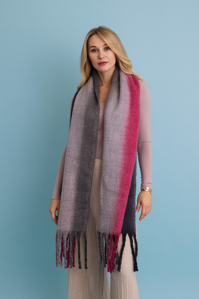 Oversized black ombre blanket scarf with colorful fringe, perfect for winter layering.