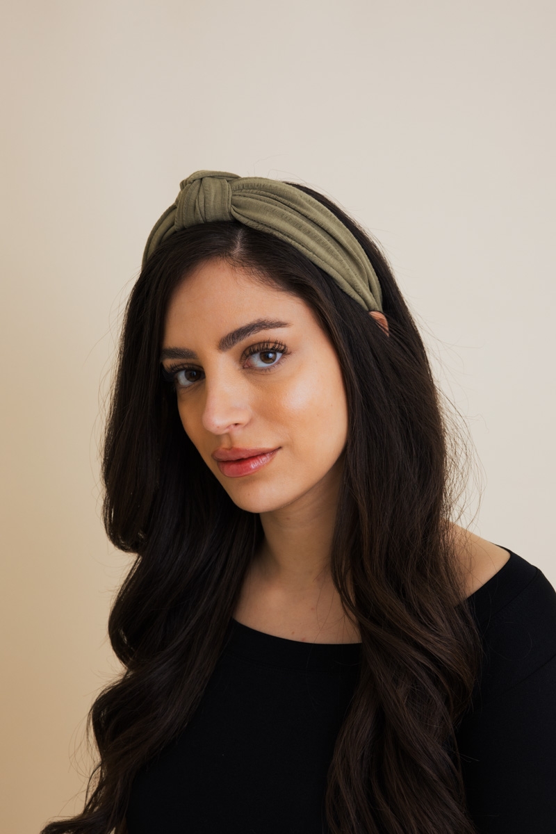 Soft pleated headband in olive, a lightweight and stylish hair accessory for women.