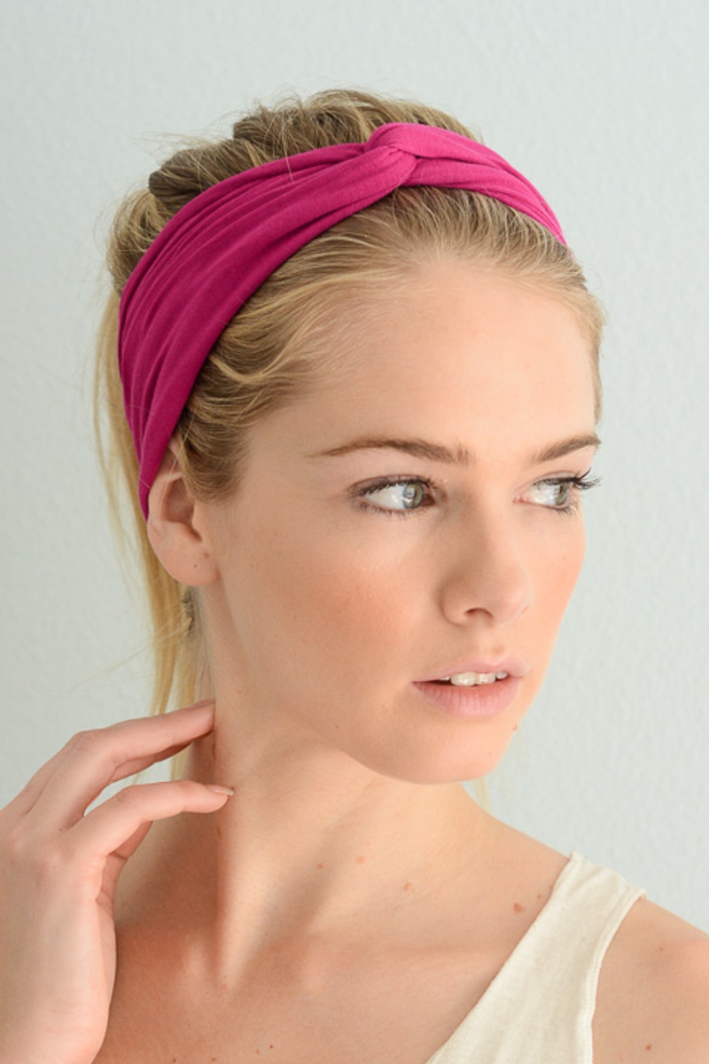 Solid twist headband in berry color, a trendy and stylish hair accessory for women.
