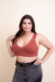Feminine plus size padded bralette featuring delicate lace details.