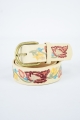 Closeup of flower embroidered statement belt