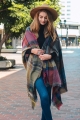 Multicolor plaid pocket ruana  where comfort meets versatile style