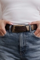 Dark brown faux leather belt with rectangular buckle, perfect for western chic outfits.