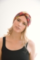 Red tropical twist headband headwrap with floral design, perfect for a chic summer look.